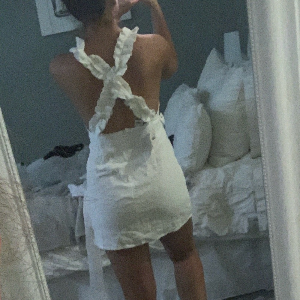 Cute white open back dress!